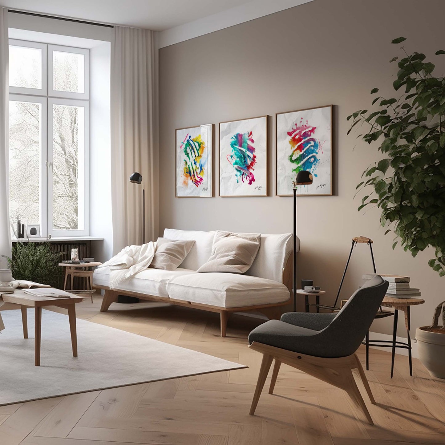 3 colorful abstract art posters in golden brass frames inside a nice home decor